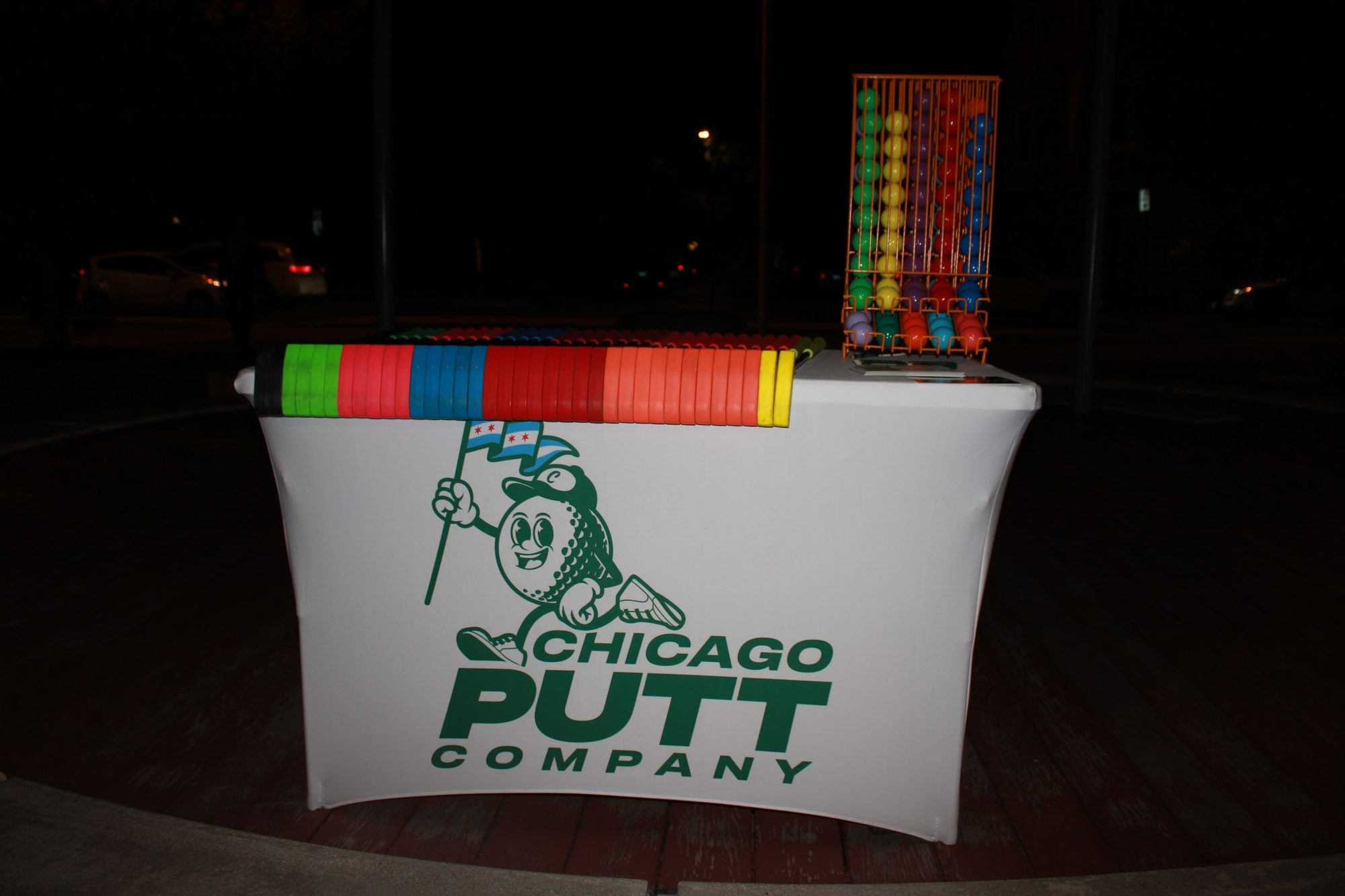Chicago Putt Company equipment table set up at an event